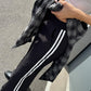 OF - Pantalone Nicolas nero con bande laterali