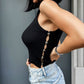 OF - Top Jinny nero con pietre e aperture