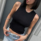 OF - Top Jinny nero con pietre e aperture